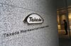 Portraits of Takeda Pharmaceutical CEO Christophe Weber and Sleek New HQ