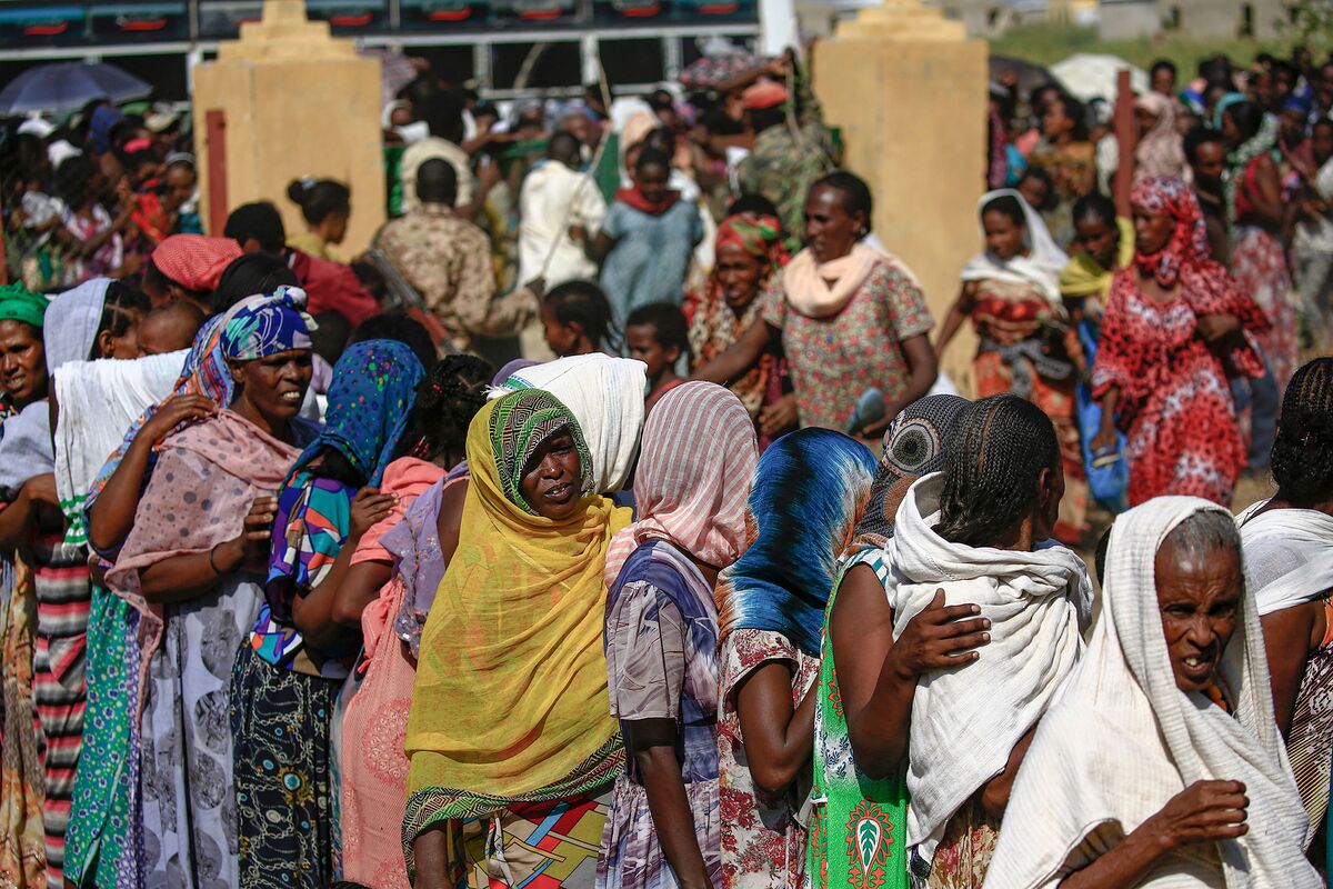Ethiopian refugees who fled the fighting in Tigray Region gather at a border reception centre in Gedaref State, eastern Sudan, on Nov. 20.