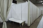 A bed in a stall at a field medical station inside the Meadowlands Exposition Center in Secaucus, N.J.