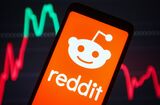 In this photo illustration, Reddit Inc. logo of an US social