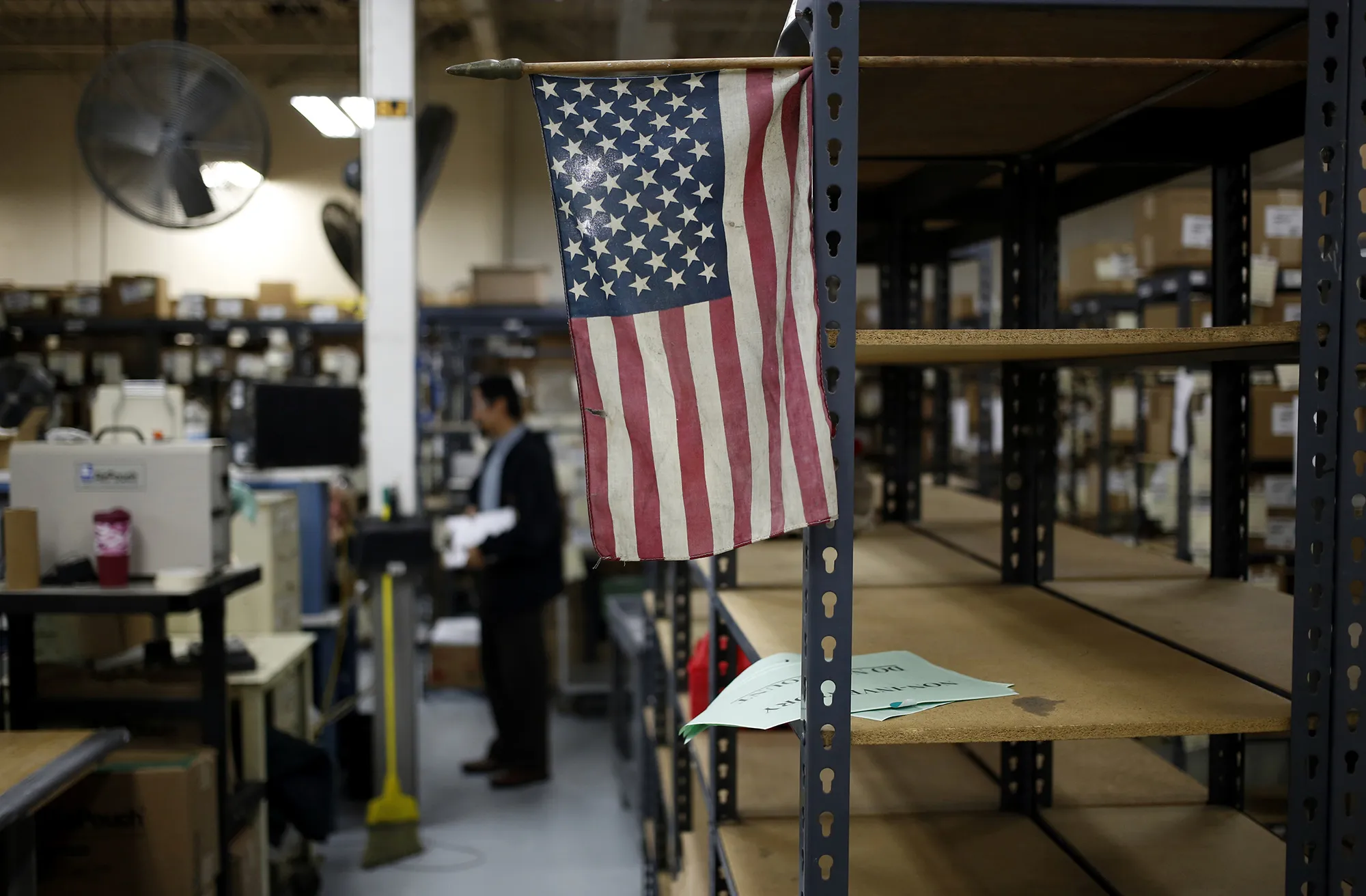 A American flag is displayed on a factory floor in Bowling Green, Kentucky.