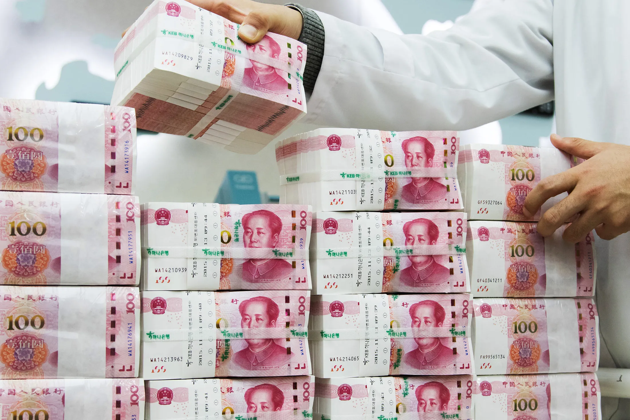 Views Of Chinese Yuan As Yuan Crunch Spurs Banks to Hoard Abroad as China Curbs Outflows