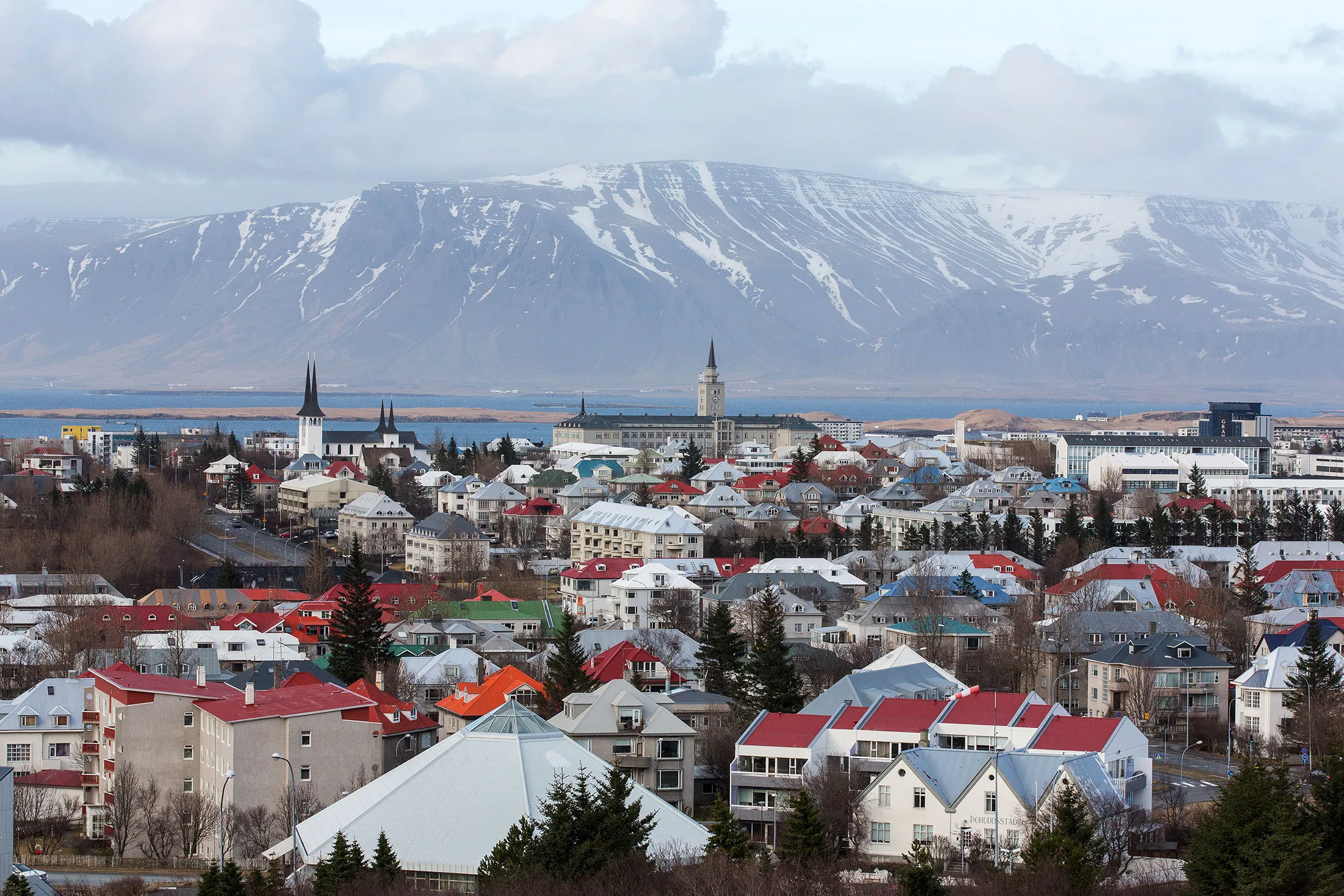 Residential properties stand on the city skyline in Reykjavik.