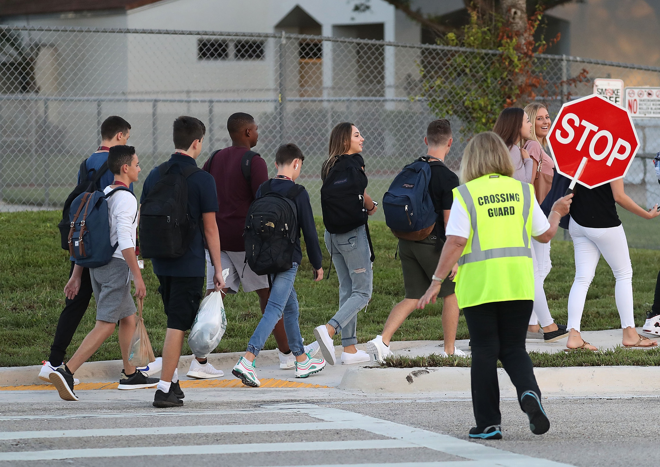 Students walk to Marjory Stoneman Douglas High School on the first day of school in Parkland, Florida,&nbsp;on Aug. 15, 2018.