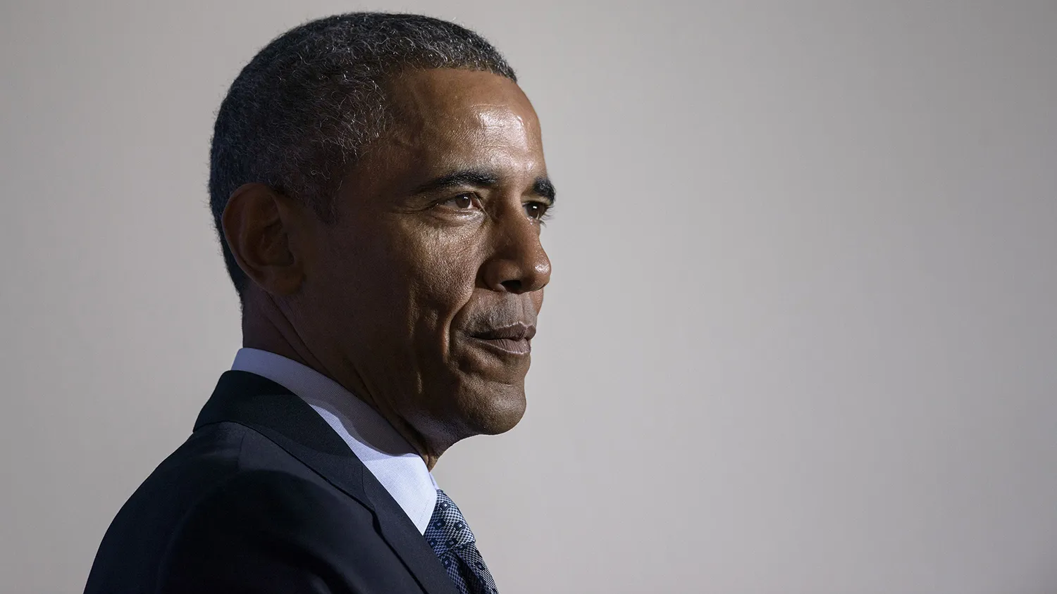 US President Barack Obama pauses while speaking at the Federal Trade Commission January 12, 2015 in Washington, DC.
