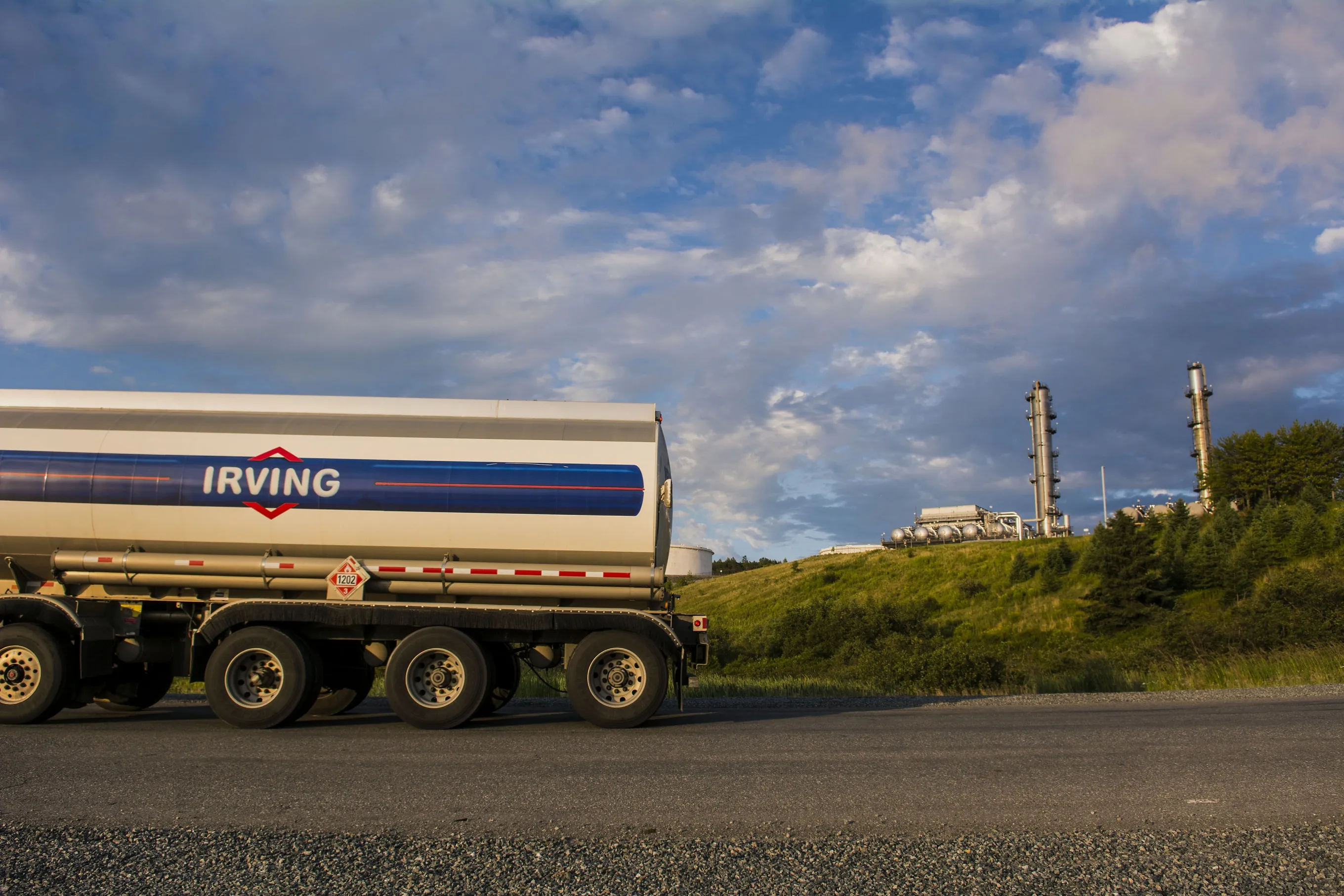 An Irving Oil&nbsp;truck drives past the company's refinery in Saint John, New Brunswick.