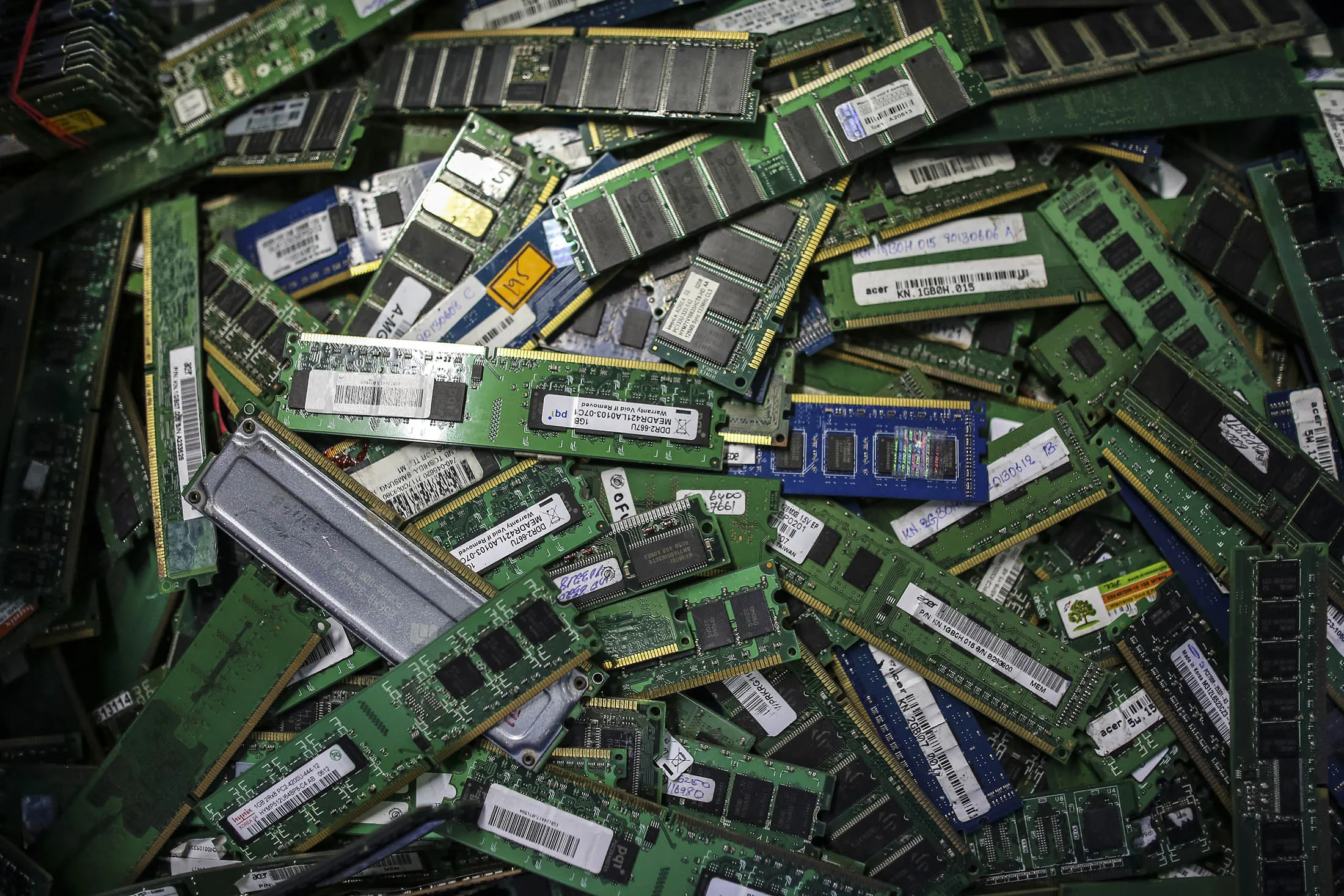 Computer RAM sit inside plastic container inside computer refurbishing department at Attero Recycling Pvt. Ltd, in Raipur Industrial area of Bhagwanpur, Roorkee, India, on Monday, Oct 07, 2013.
