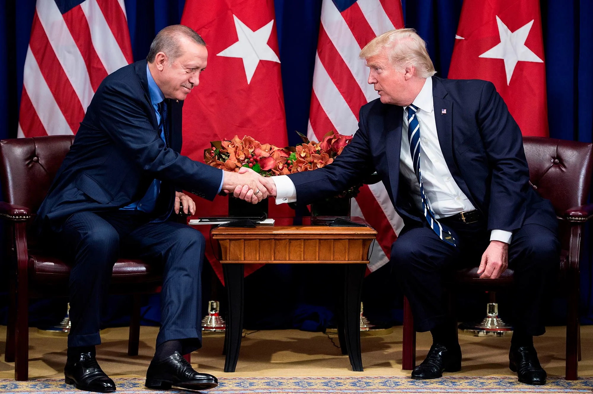 Turkey's President Recep Tayyip Erdogan and U.S. President Donald Trump shake hands before a meeting at the Palace Hotel during the 72nd United Nations General Assembly on Sept. 21, 2017.
