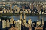 The Dakota apartment building, center, stands among residential properties in the Upper West Side (UWS) in this aerial photograph taken over New York, U.S., on Saturday, Oct. 2, 2010.