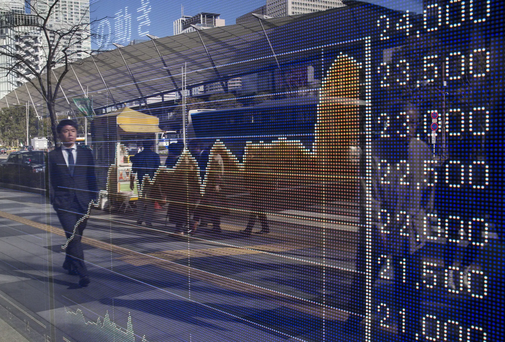 An electronic stock board outside a securities firm in Tokyo, Japan.