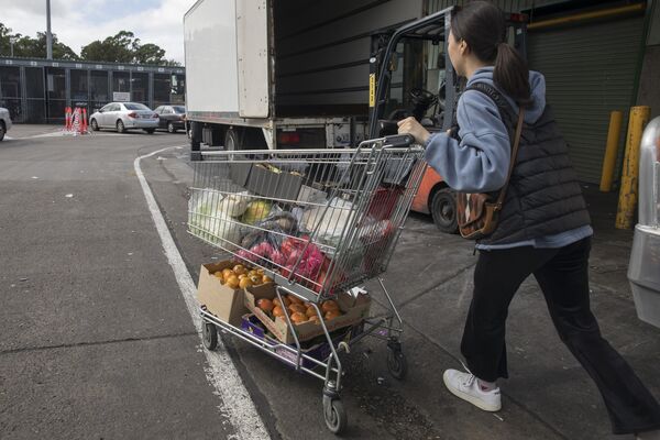 Shoppers at Paddy's Markets Ahead of Australia's CPI