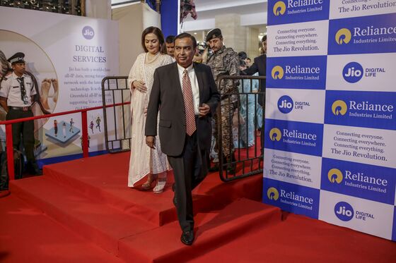 Reliance Surges Most Since 2017 on Ambani Plan to Slash Debt