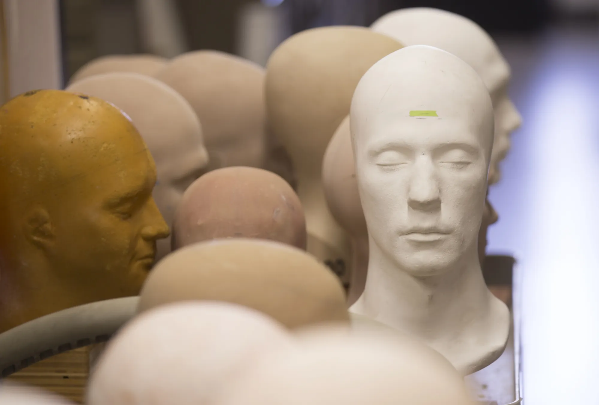 Head casts of performers sit in a room at Cirque de Soleil headquarters in Montreal, Quebec, Canada.