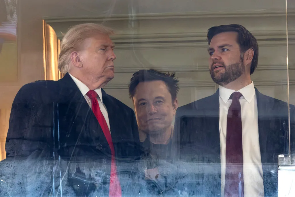 Donald Trump, Tesla CEO Elon Musk and Vice President-elect JD Vance at a football game in&nbsp;December.