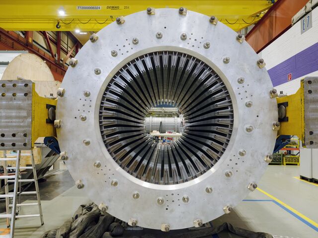  This stator is made up of 9,000 individual metal plates that help direct electromagnetic forces during operation.