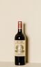 A 2015 sample bottle of Chateau Angelus wine is displayed at the Chateau Angelus estate in Saint Emilion, France, on Thursday, April 14, 2016. XXX ADD SECOND SENTENCE. Photographer: Marlene Awaad/Bloomberg