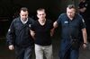 Alexander Vinnik arrives at court in Thessaloniki, Greece on Oct. 4, 2017.
