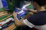 Leather belts are made at the Guangzhou Jinhuamei Leatherware Co. factory in Guangzhou, China.