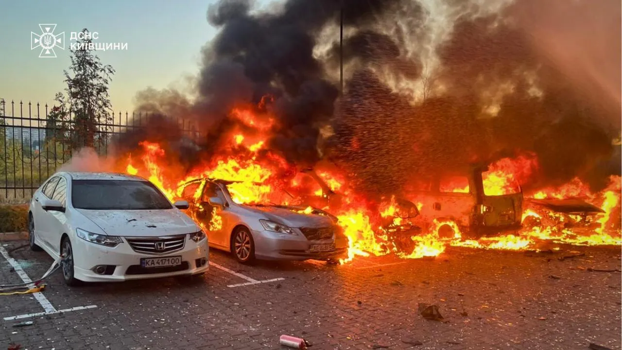 Cars on fire after a Russian missile strike, in Kyiv, Sept. 20.