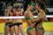 Brazil's Agatha Bednarczuk, second right, and Barbara Seixas De Freitas, right, celebrate after winning the women's beach volleyball semi-final match against the USA team on August 16, 2016.