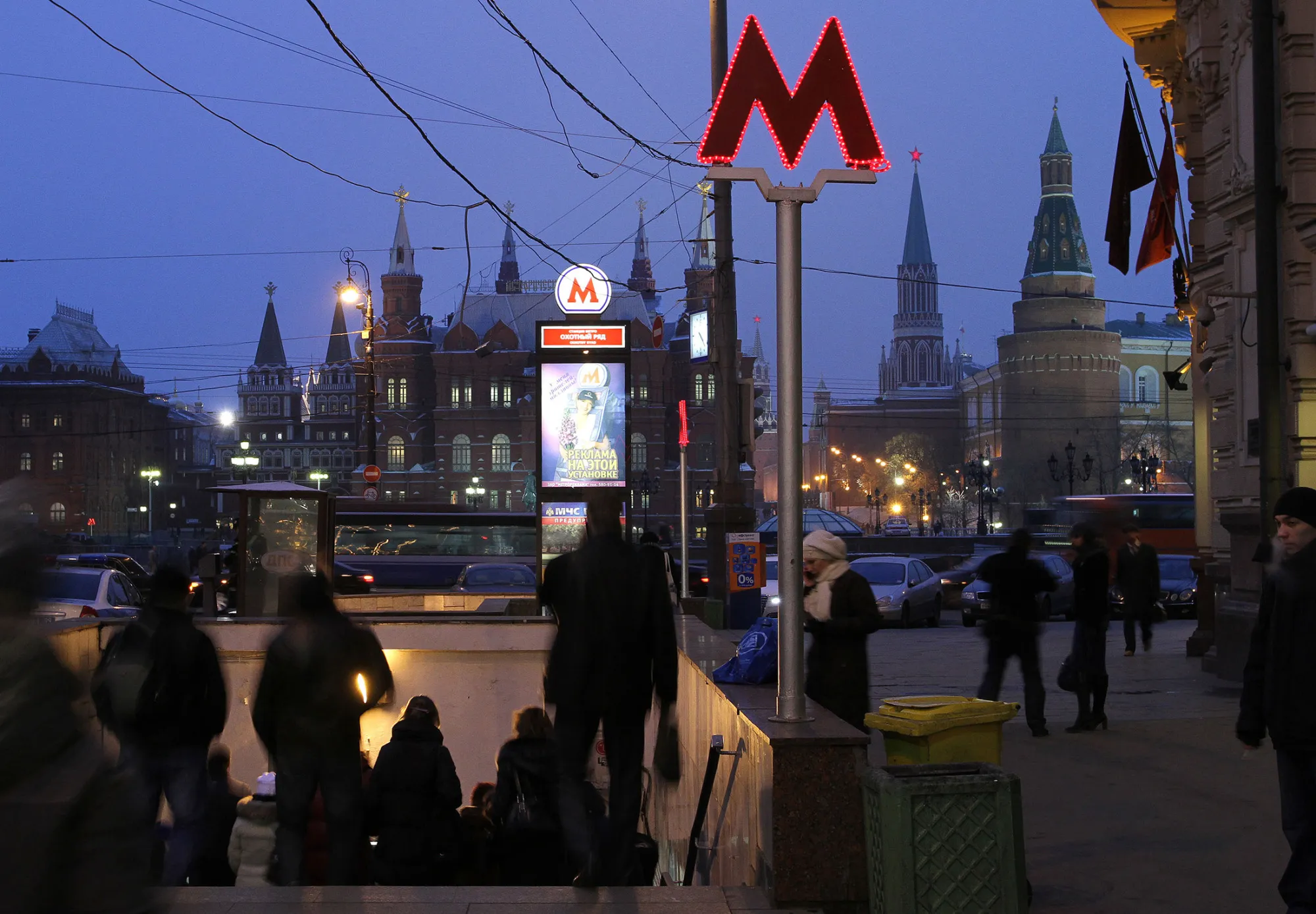 Pedestrians enter the Okhotny Ryad metro station in central Moscow, Russia, on Tuesday, Nov. 23, 2010. Russia's government plans to sell OAO Moscow Metrostroy, the 79-year-old company that built Moscow's subway system, as Mayor Sergei Sobyanin seeks to expedite the expansion of the capital's transportation network to ease traffic congestion.