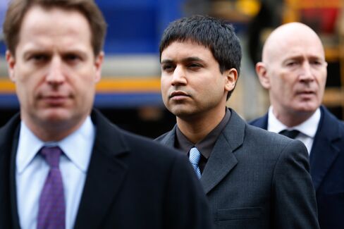 Navinder Singh Sarao, center, arrives at Westminster Magistrates’ Court.