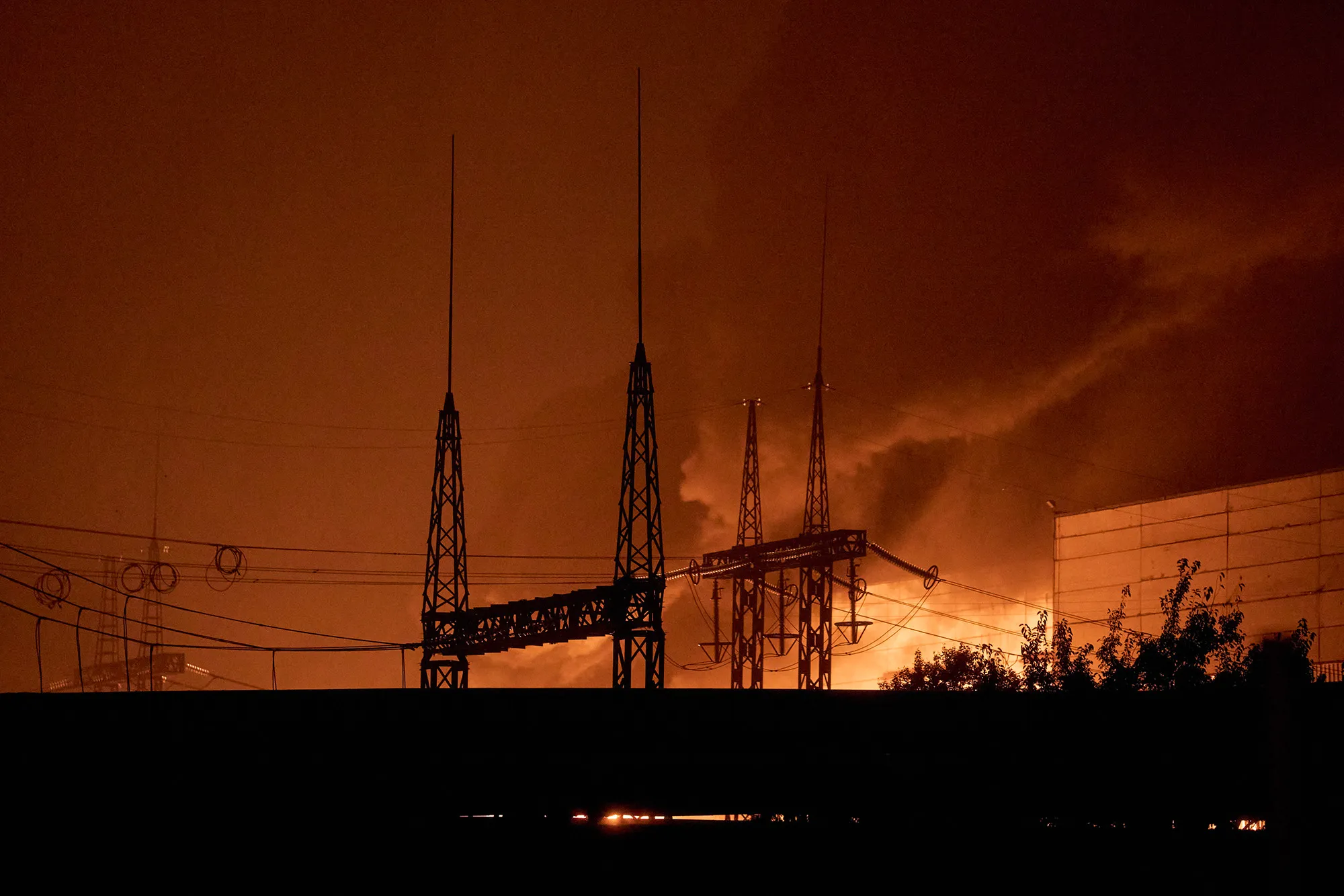 Firefighters battle flames at a thermal power plant following a series of explosions in Kyiv&nbsp;on Oct. 10.