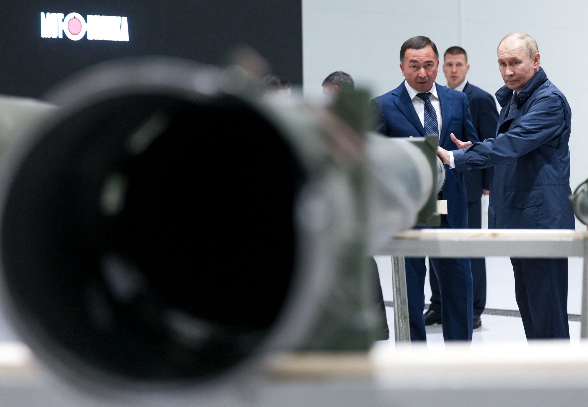 Russia’s President Vladimir Putin visits a military equipment manufacturer in Perm, in a photo released by Russian state media.