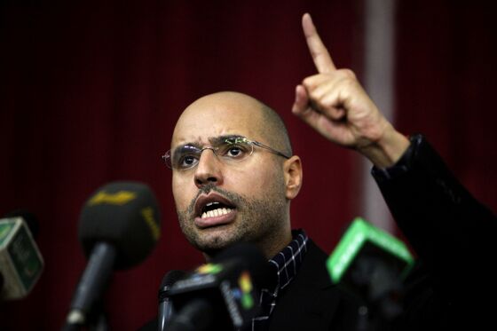 Qaddafi’s Son Won’t Rule in Libya, Aide to ‘Putin’s Chef’ Says