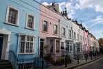Colorful facades of residential houses stand in Chelsea, west London, U.K., on Thursday, Nov. 16, 2017. London's housing market is being battered from all sides. A survey by the Royal Institution of Chartered Surveyors showed a price gauge at its lowest level for seven years, and far below the national average.