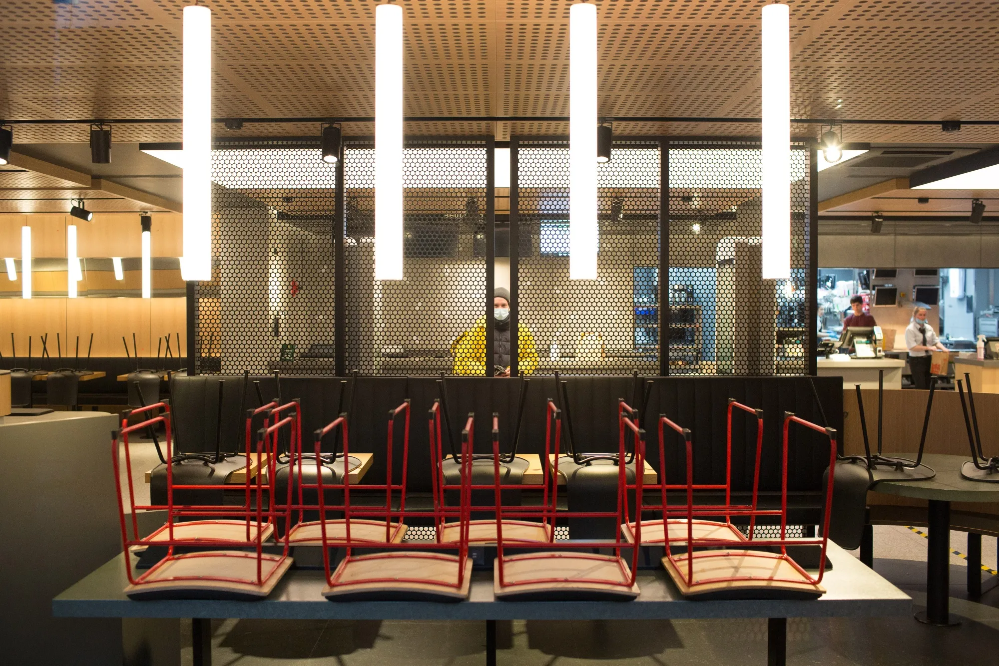 Chairs sit on a table at a restaurant in Moscow.