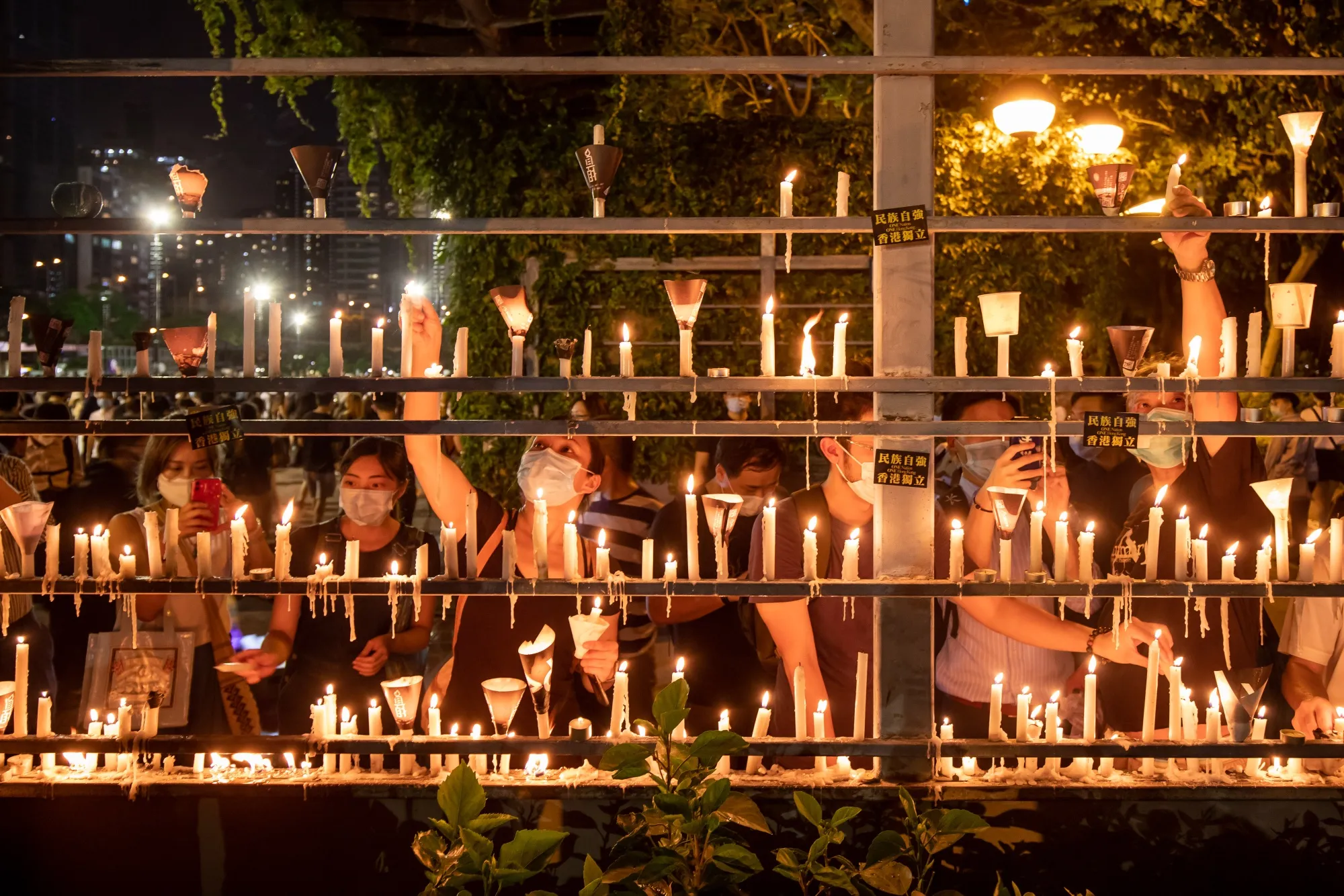Demonstrators light candles at Victoria Park to commemorate the 31st anniversary of the Tiananmen Square crackdown, in Hong Kong,&nbsp; on June 4, 2020