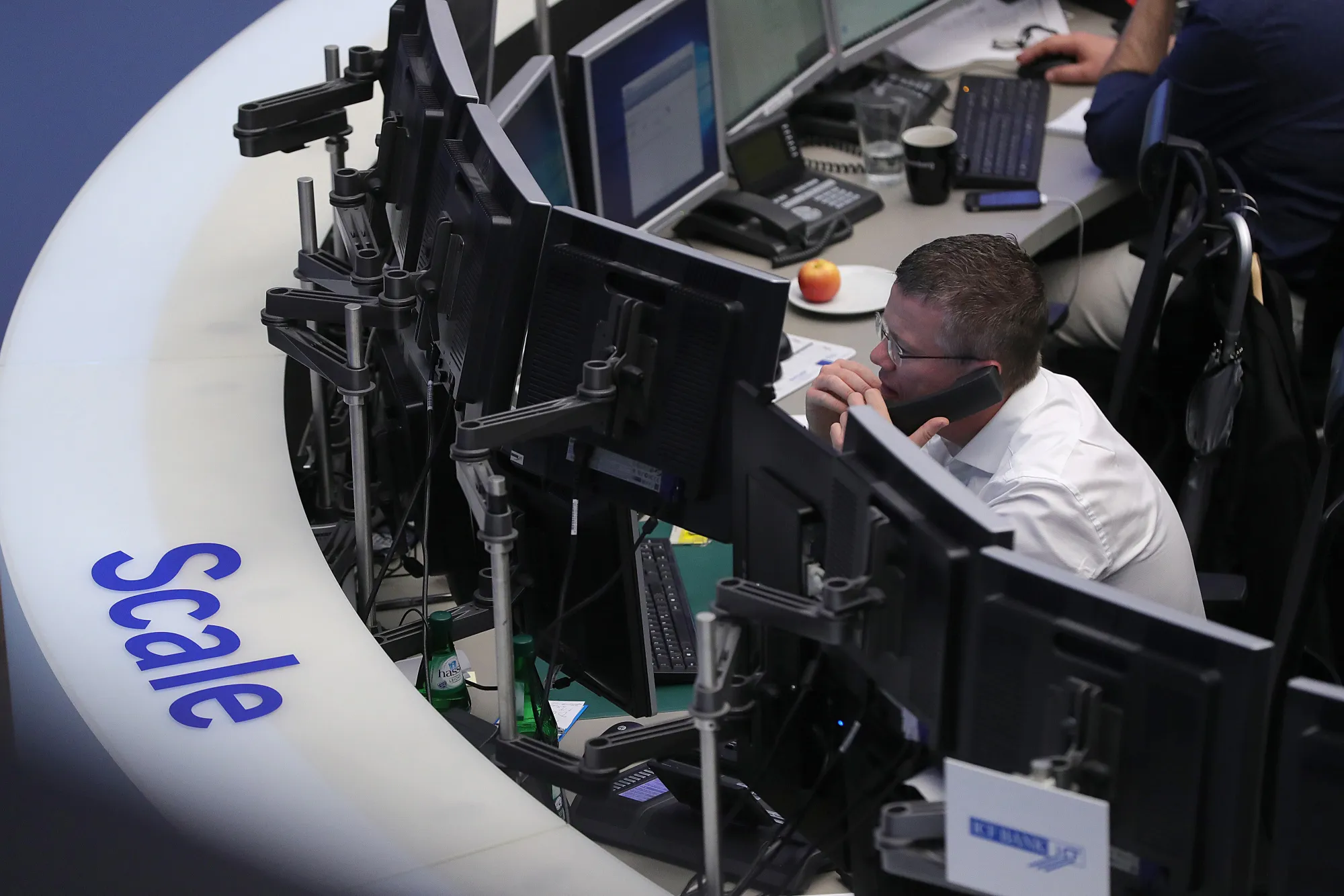 A financial trader watches data screens at the Frankfurt Stock Exchange, operated by Deutsche Boerse AG, as the U.K. triggers Article 50 of the Lisbon Treaty in Frankfurt, Germany, on Wednesday, March 29, 2017. In a six-page letter submitted on Wednesday to EU President Donald Tusk, U.K. Prime Minister Theresa May formally triggered two years of talks that will end with Britain leaving its largest trading partner after four decades of membership.