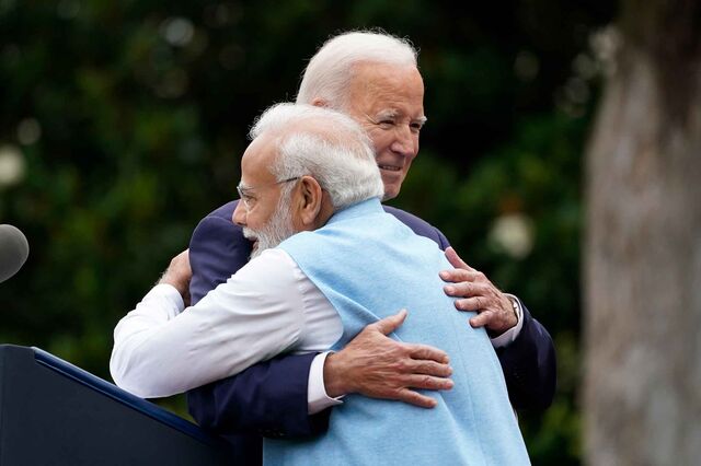 Joe Biden and Narendra Modi embracing.
