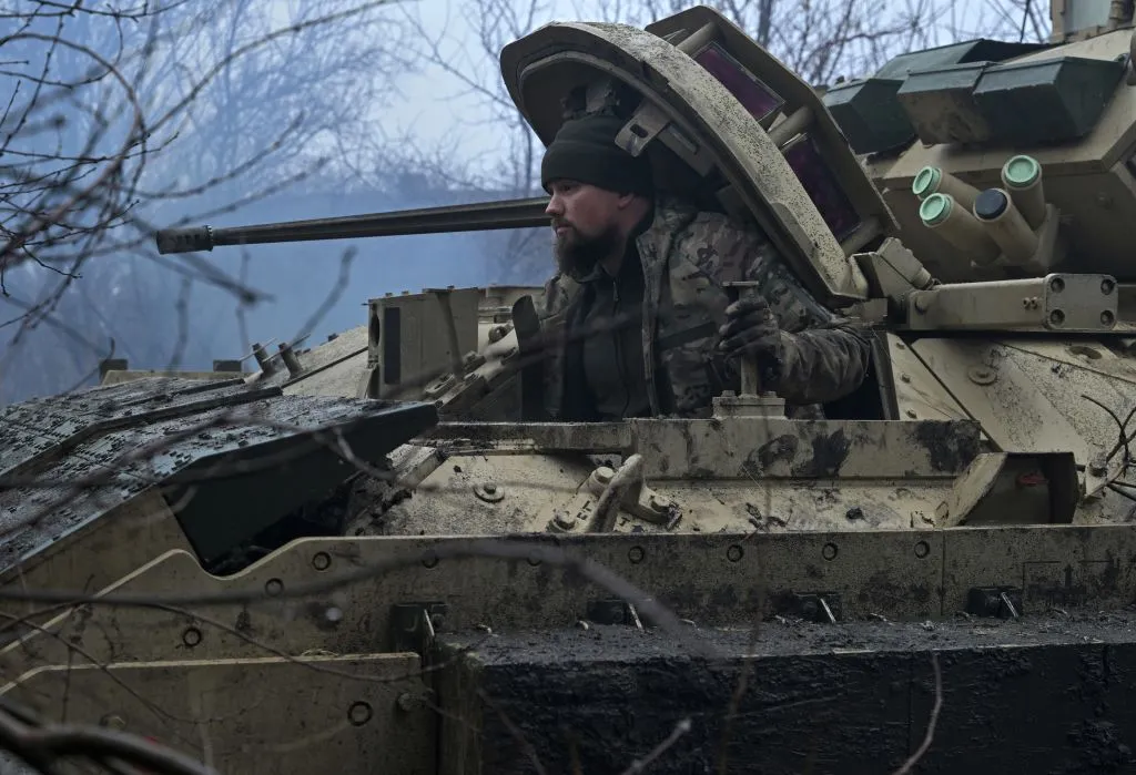 A Ukrainian serviceman prepares for combat in the&nbsp;Donetsk region.