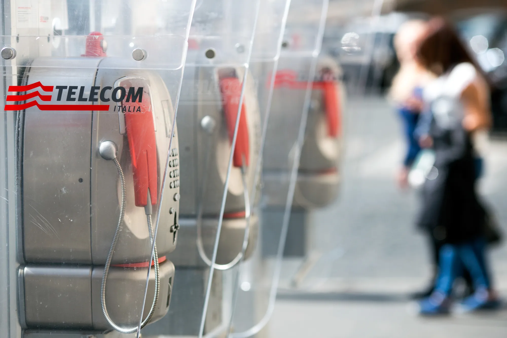 A logo sits on a fixed-line public telephone booth, operated by Telecom Italia SpA, in Rome, Italy.