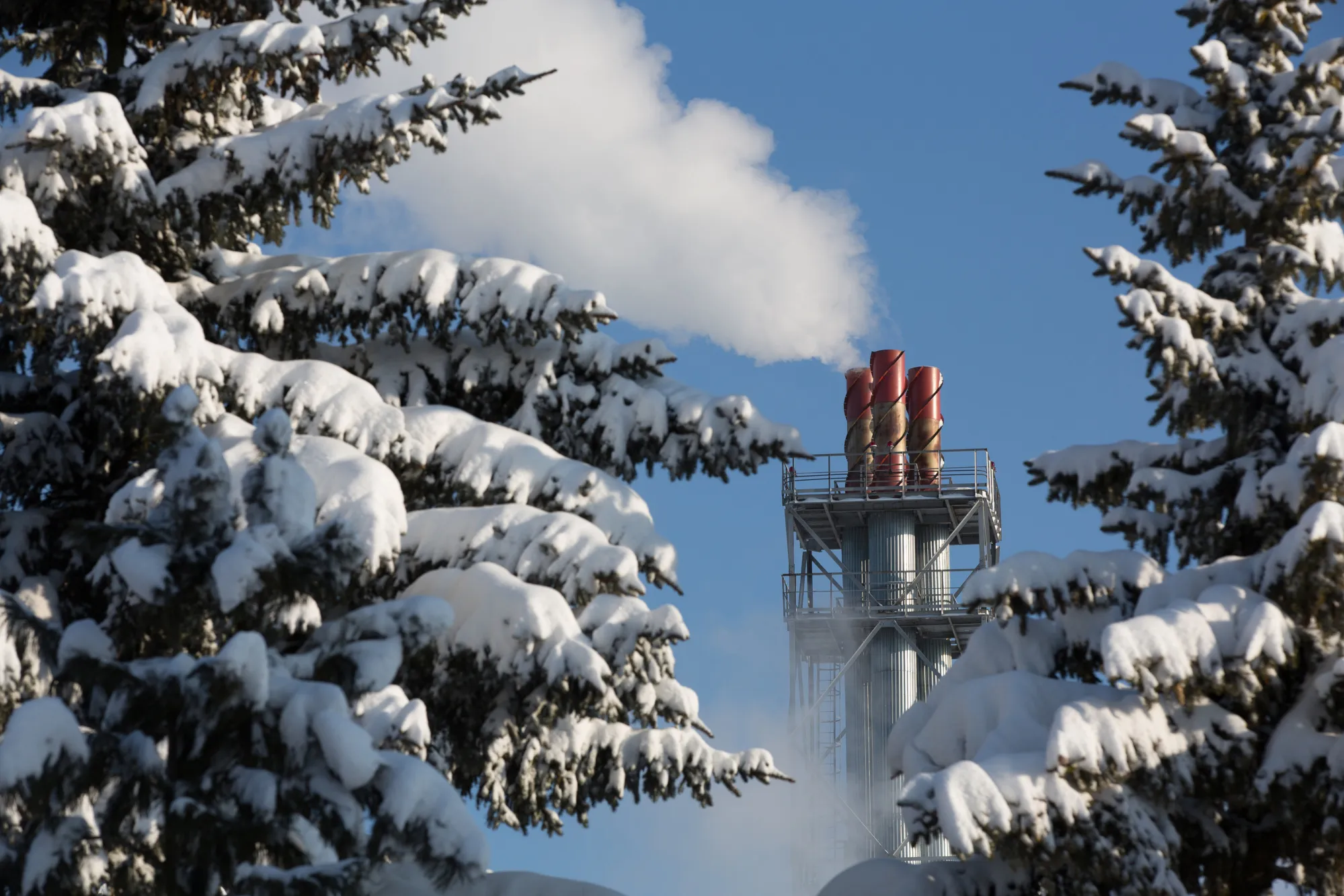 Vapor escapes from chimneys at a&nbsp;power plant in Rodniki Industrial Park,&nbsp;Russia.