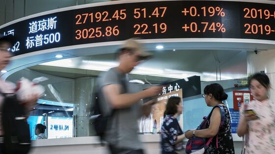 Asian Stocks, U.S. Futures Fall Amid Tech Concern: Markets Wrap