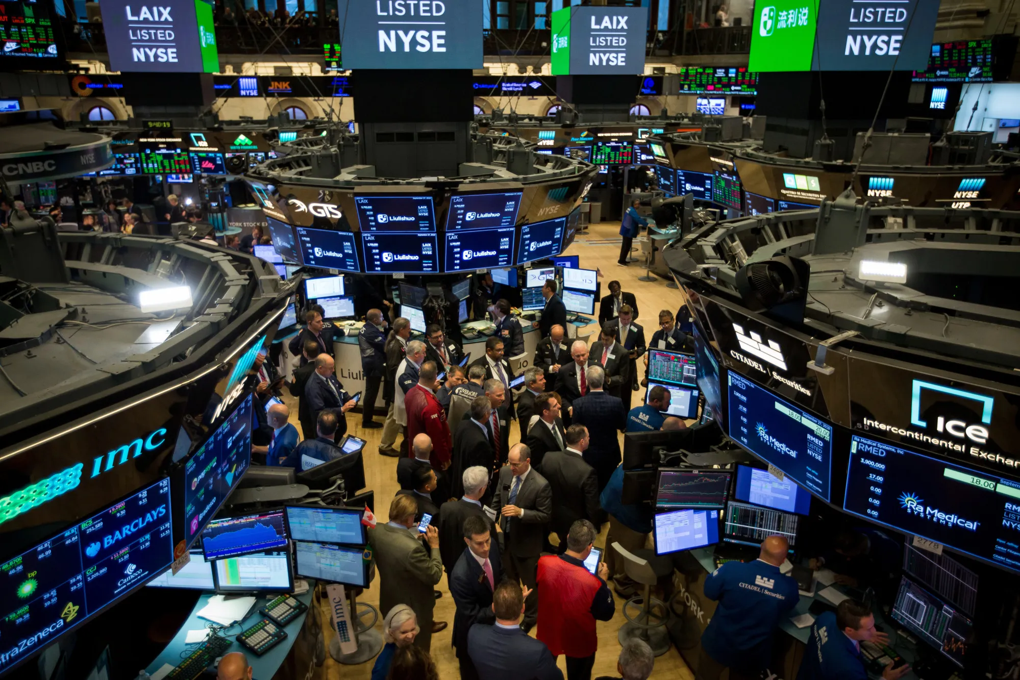 Traders work on the floor of the New York Stock Exchange.