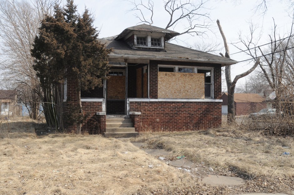 A boarded-up house in Gary, one of thousands of blighted properties.