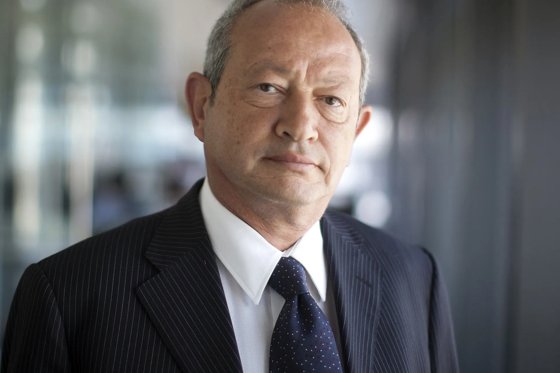 Naguib Sawiris.

