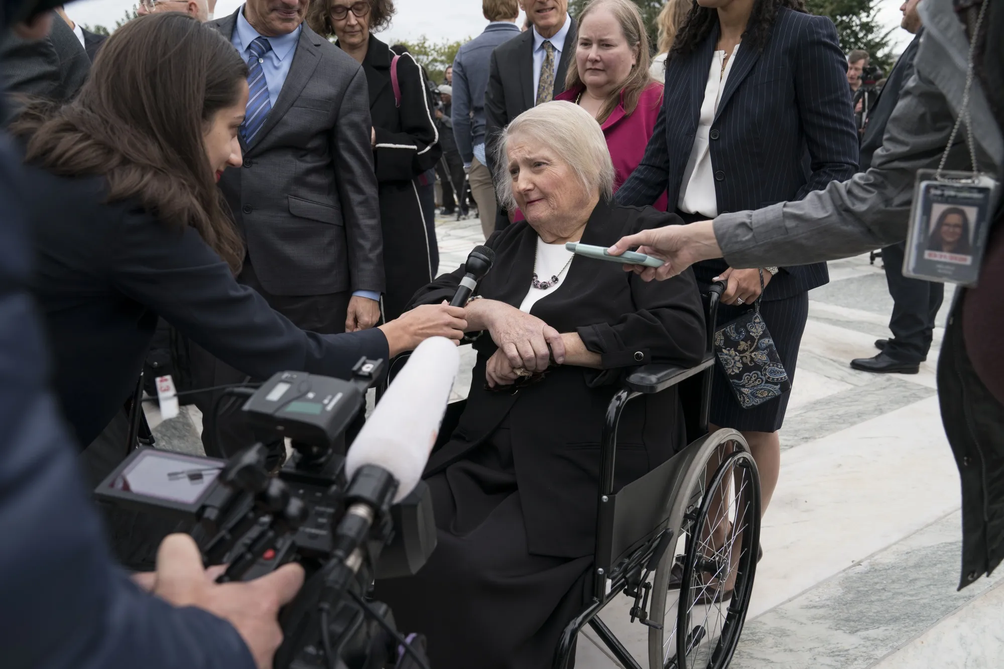 Aimee Stephens speaks outside of the U.S. Supreme Court in Washington, D.C., on&nbsp;Oct. 8, 2019.&nbsp;