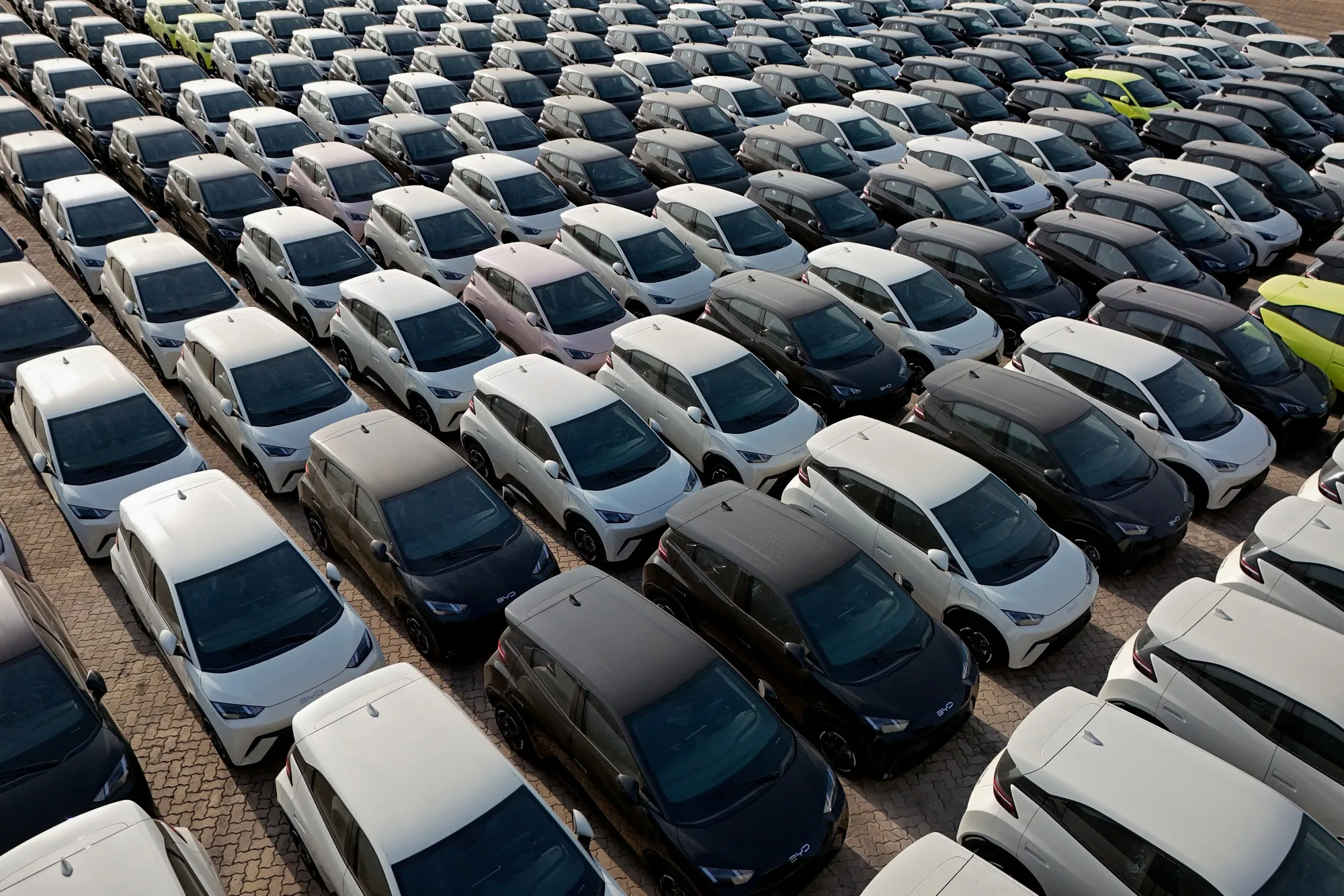 Electric cars for export&nbsp;at a port in Yantai, China.