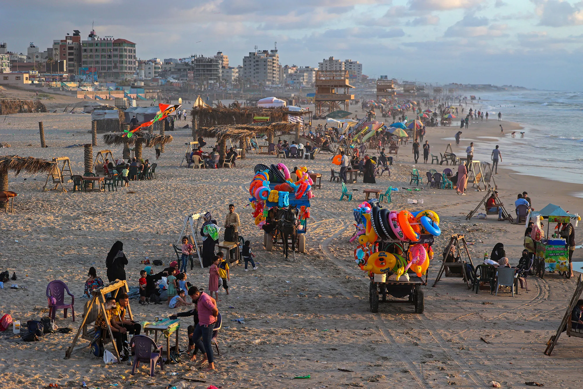 Palestinians gather at the beach in Gaza city.