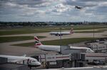 Passenger aircraft, operated by British Airways, on the tarmac at London Heathrow Airport in London, UK.