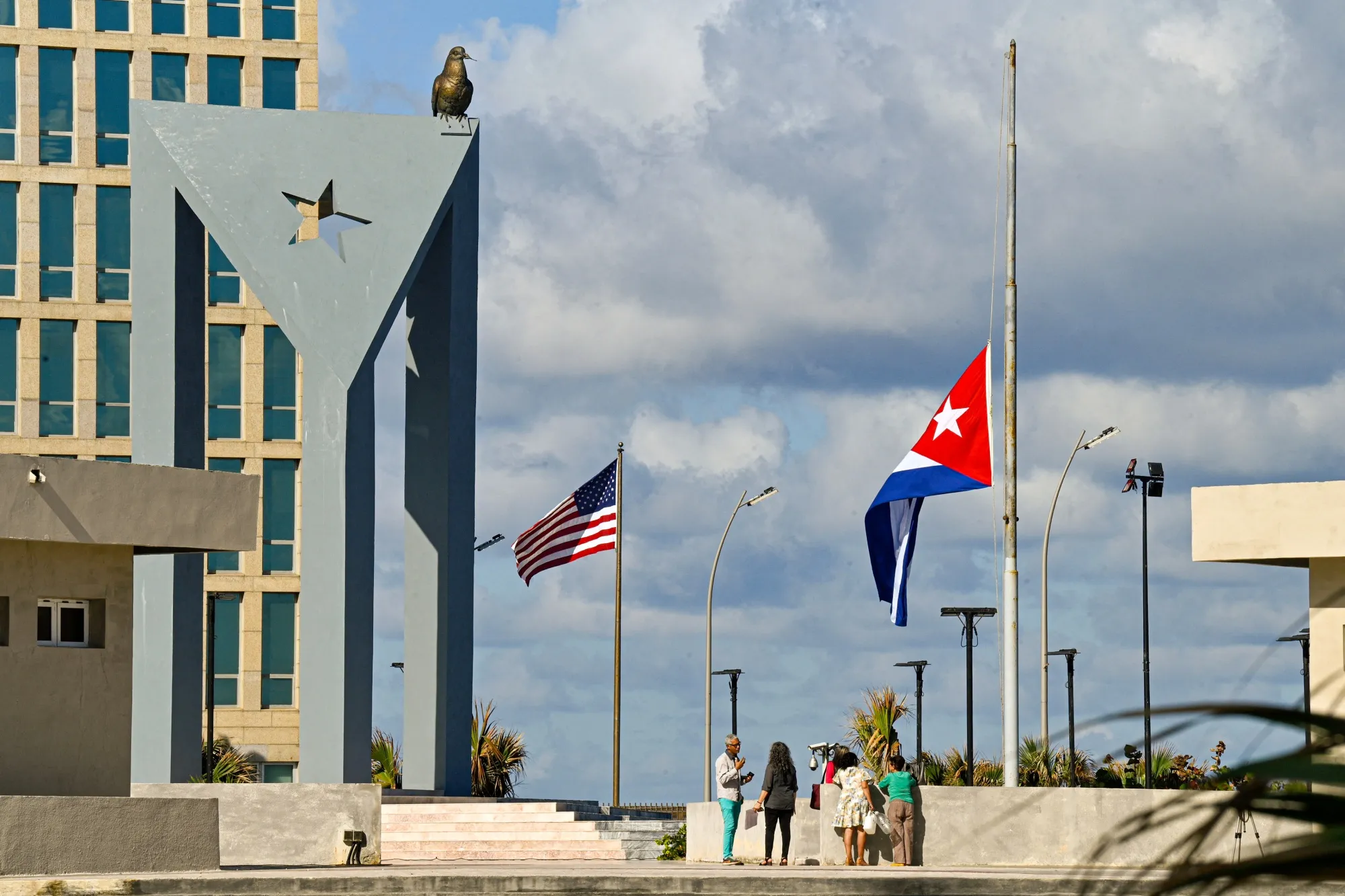 The Cuban national flag flies at half-mast outside the US Embassy in Havana on Jan. 5.