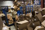 A worker packs teddy bears at a factory in Shelburne, Vermont.
