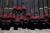 Oil drill pipe casings sit at a Colgate Energy LLC site in Reeves County, Texas, U.S., on Wednesday, Aug. 22, 2018. Spending on water management in the Permian Basin is likely to nearly double to more than $22 billion in just five years, according to industry consultant IHS Markit.