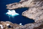 An iceberg as it floats along the eastern cost of Greenland near Kulusuk (aslo spelled Qulusuk) on Aug. 15, 2019.