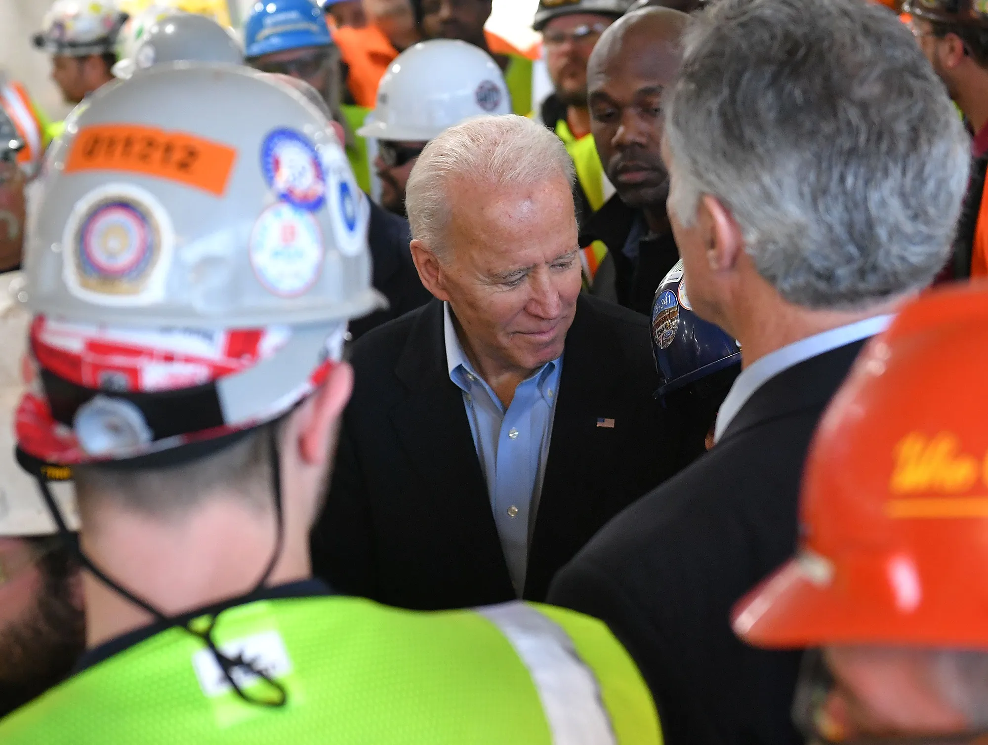 Joe Biden meets workers as he tours the Fiat Chrysler plant in Detroit on March 10.